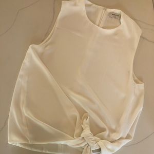 Classic white blouse with side knot.